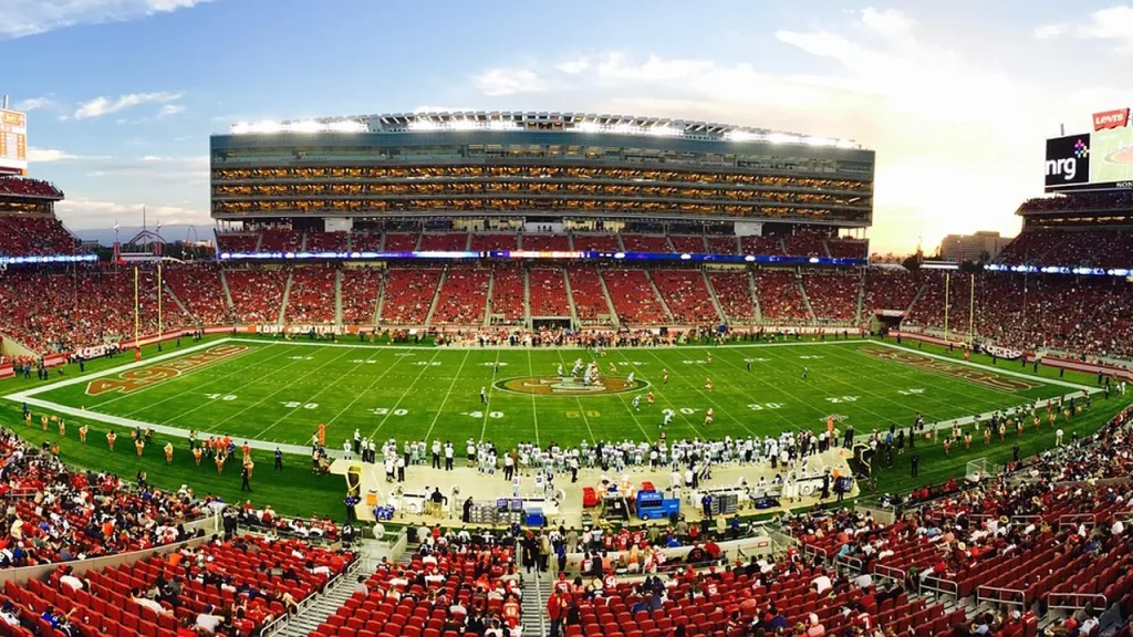 A large crowd at a stadium during a game