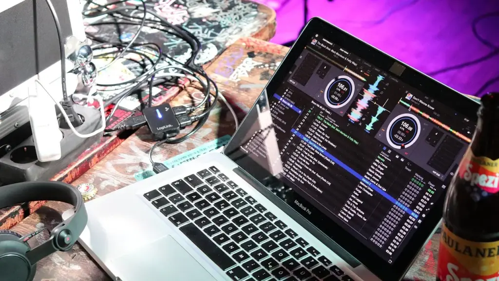 Studio setup with computer, headphones and audio workstation