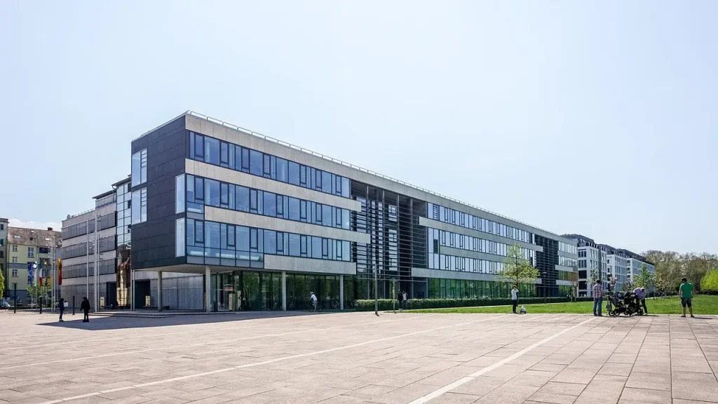 A government office building with AI signage on the facade
