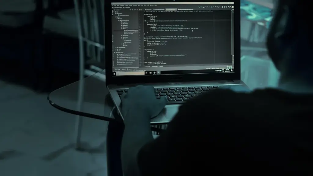 Close up of a computer monitor with code and alerts