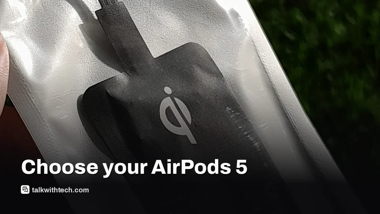 Earbuds being charged on a wireless pad with light