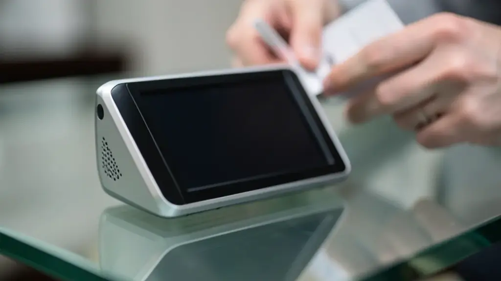 Side-angle close-up of dual-screen handheld emphasizing build quality.