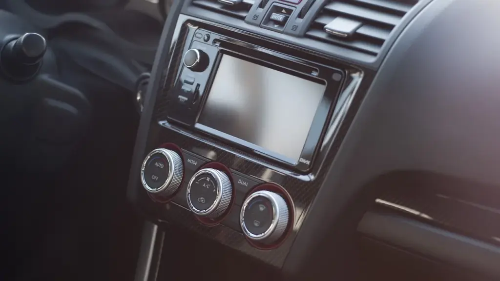 Car dashboard showing an Android Auto screen with app icons