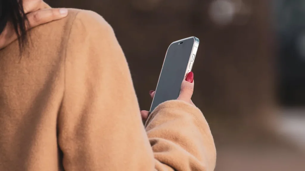 Close up of a smartphone screen with a focus on haptic feedback concept