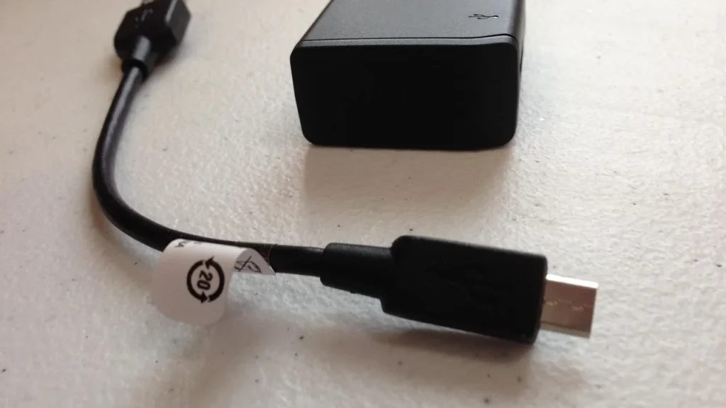 USB-C charger with power rating on label