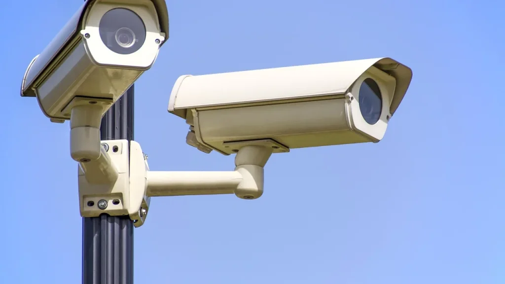 A security camera mounted on a wall