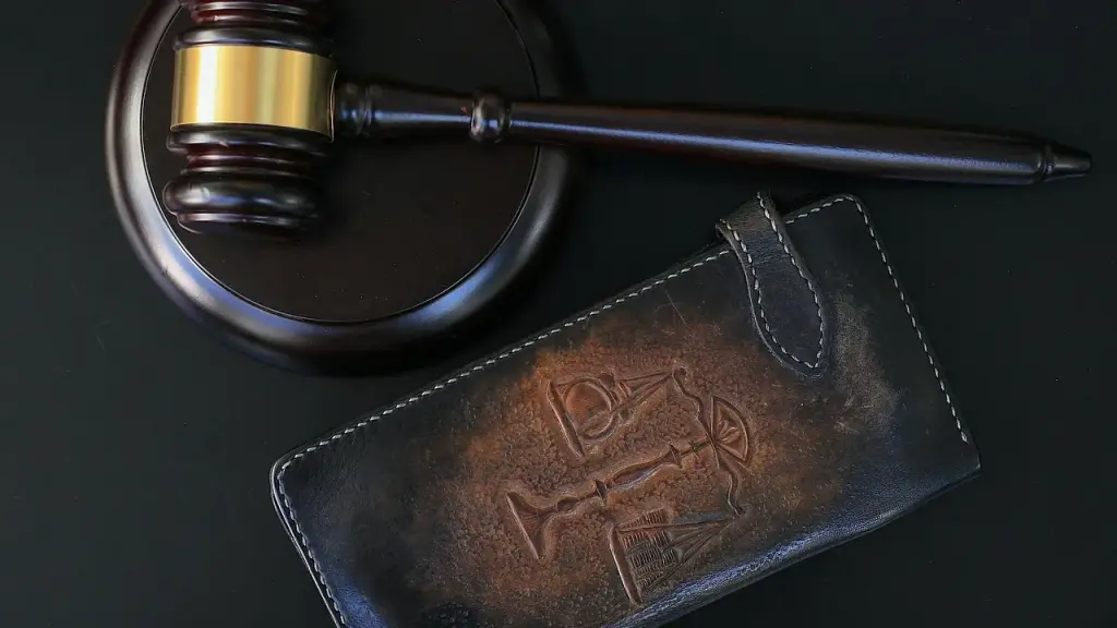Gavel and legal documents on a courtroom bench