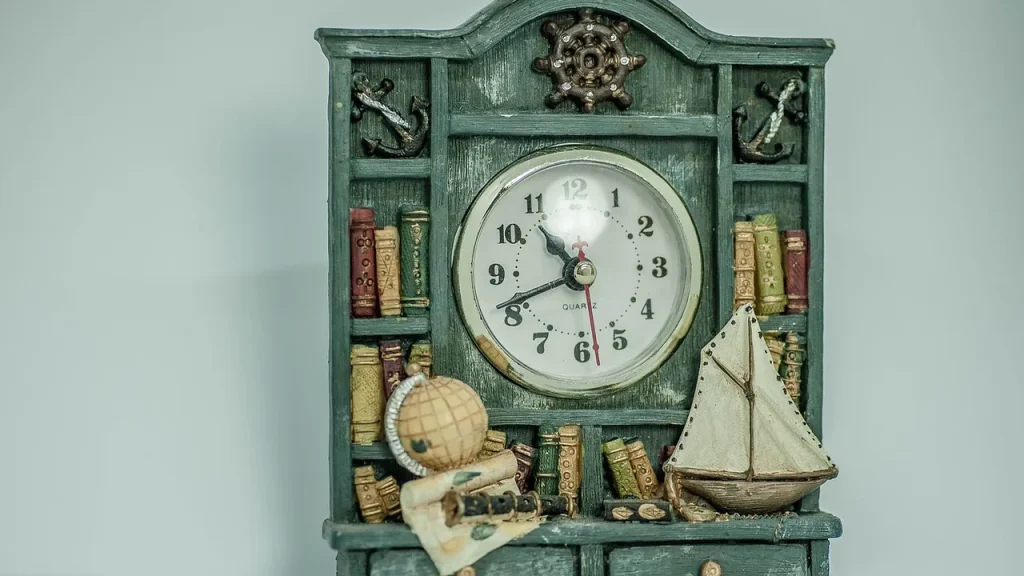 Studio shot with clocks and a globe suggesting international heist drama