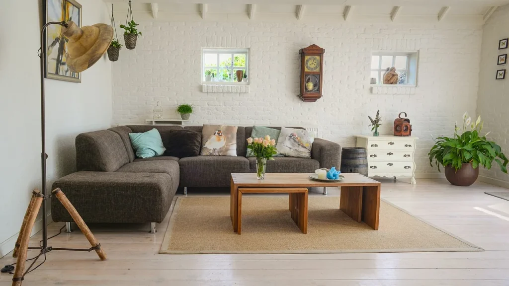 Living room setup with a TV and speaker devices in a bright family space.
