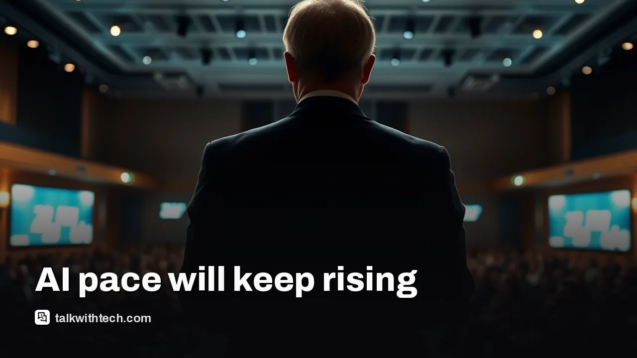 Backstage view of a conference stage with silhouetted speaker from behind