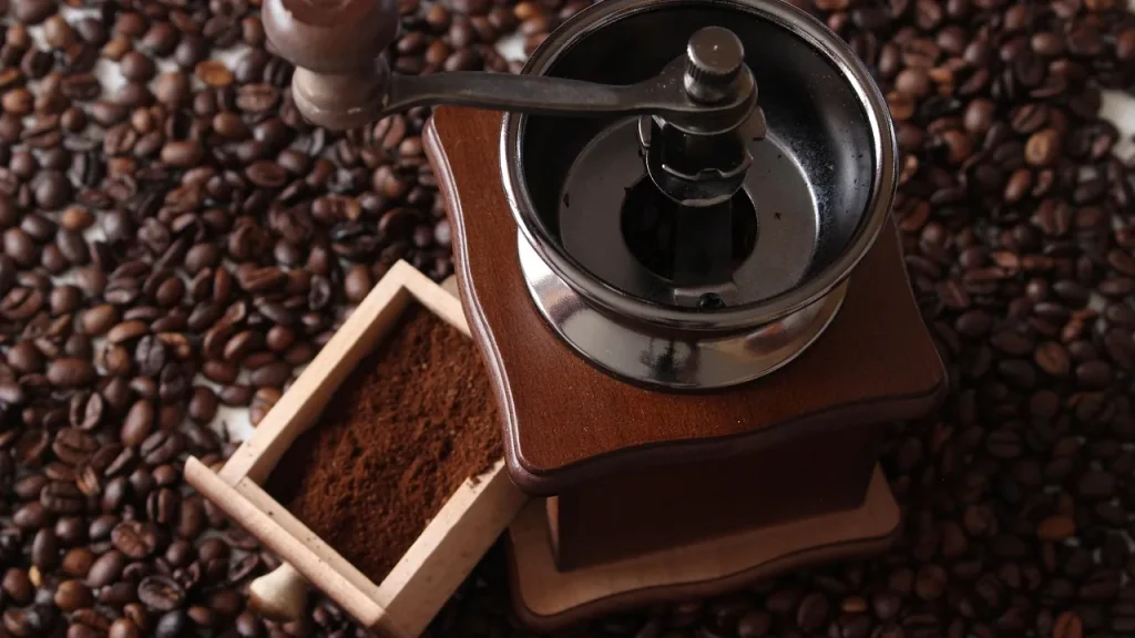 Close-up of ground coffee being dispensed