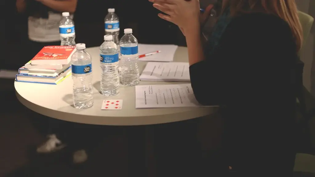 People in a conference room discussing a plan on a screen