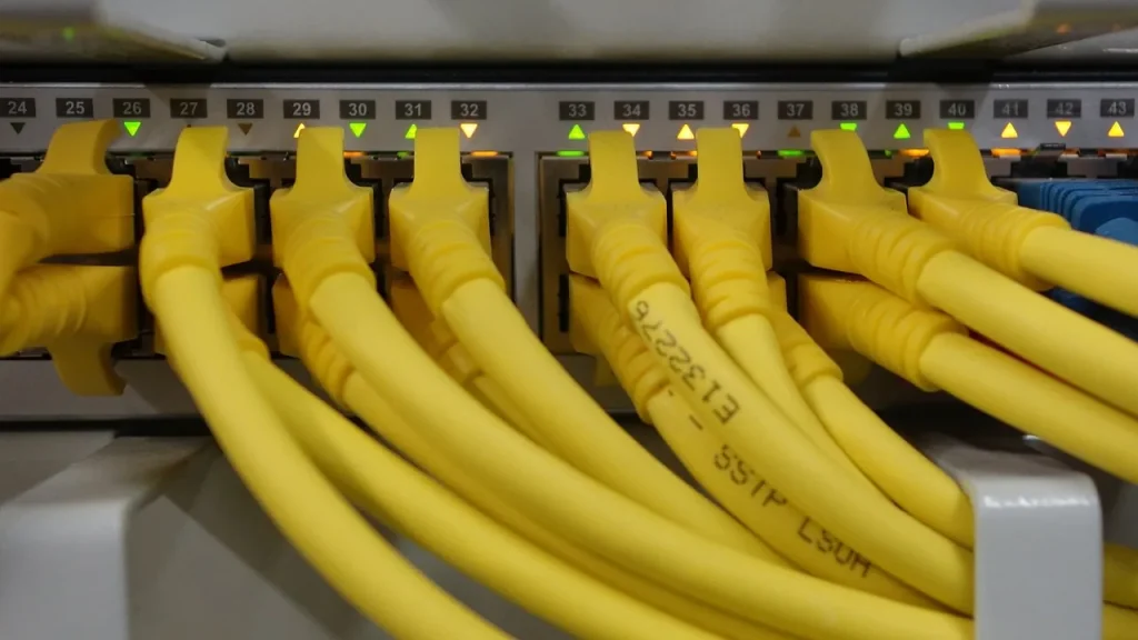 Cables and servers in a data center, representing traffic routing