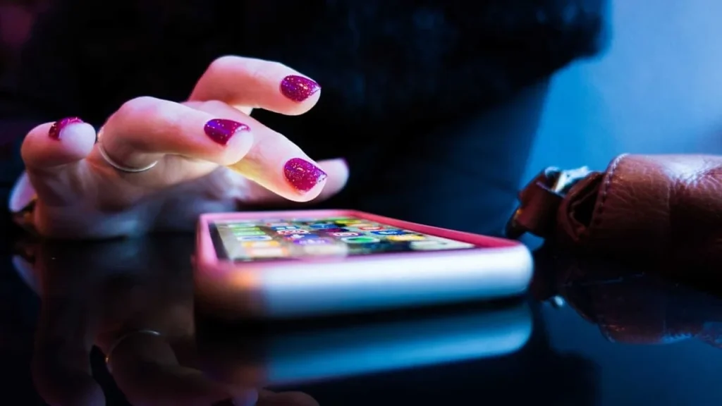 Smartphone screen lit up in bright outdoor light