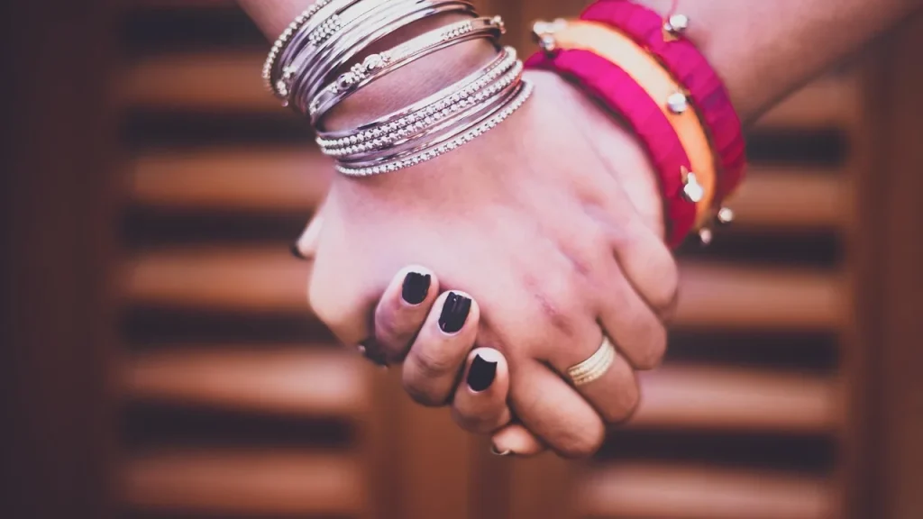 A handshake at a formal event promoting advocacy