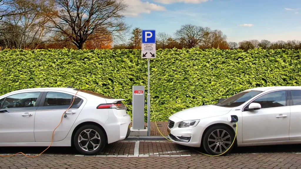 Street scene with autonomous vehicle charging hub nearby