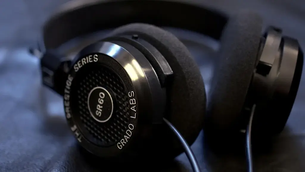 Close-up of studio headphones and sound mixer