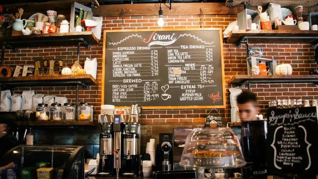 Cozy coffee shop interior with warm lighting and customers