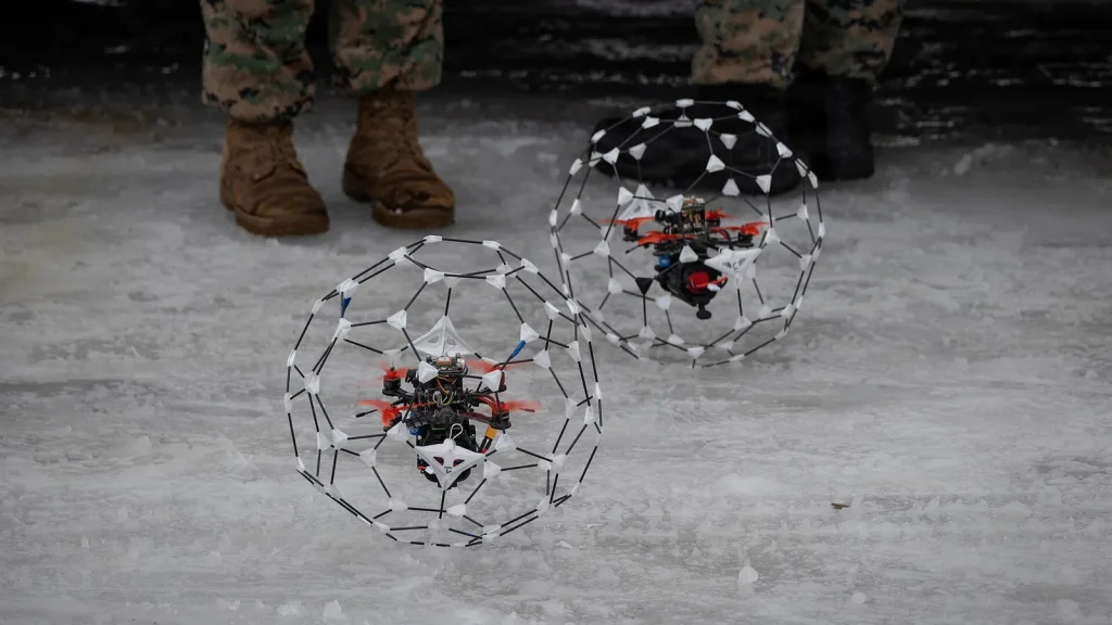 A small drone showing sensors mounted under the body
