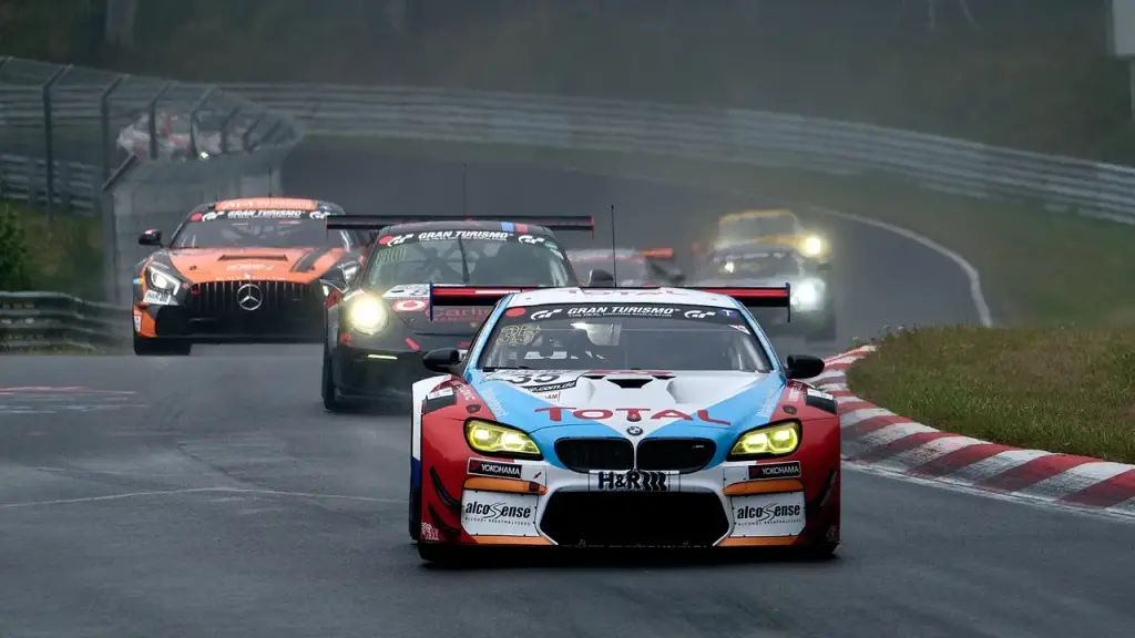 A multi-class prototype race on a track with cars in different classes