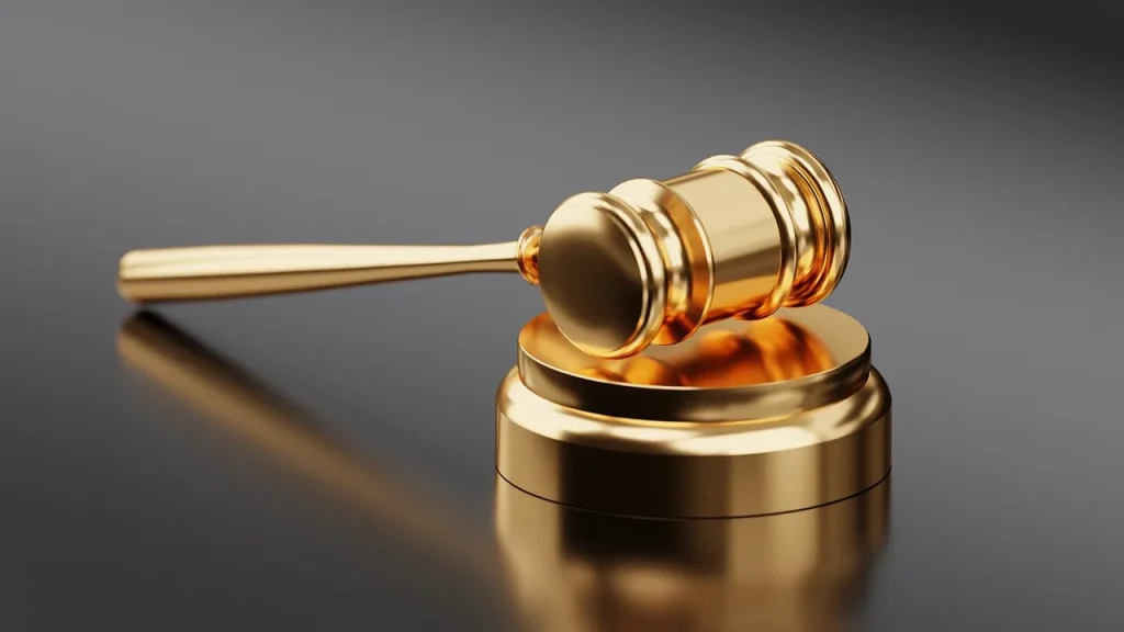 Legal documents and a gavel on a desk