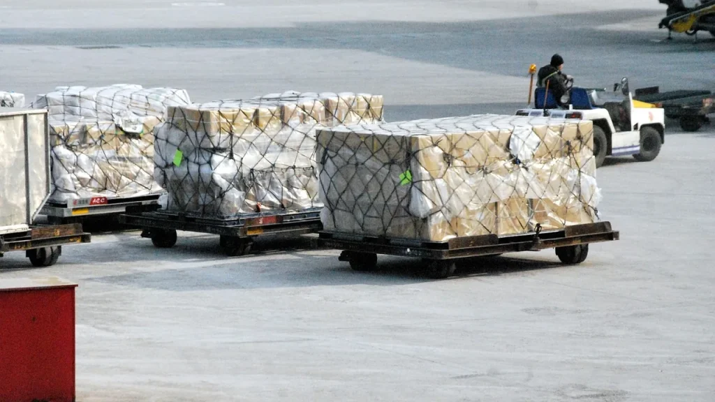 Cargo plane and pallets in a loading area