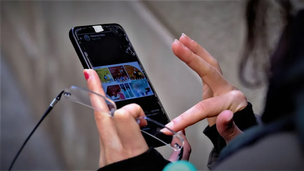 A smartphone showing a social media feed on screen