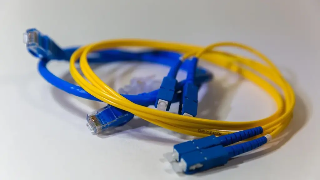 Close-up of fiber optic cables and networking hardware