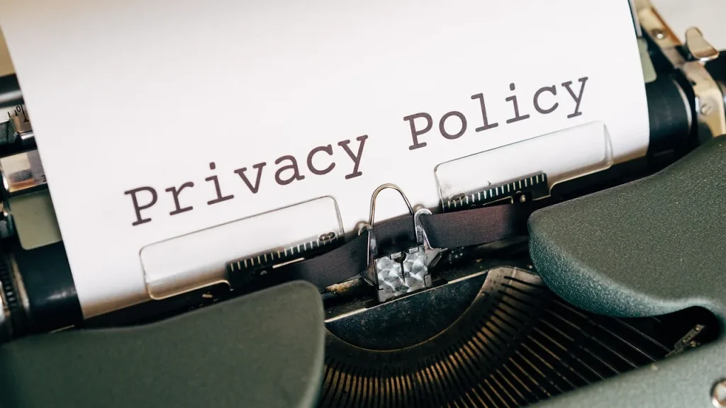 Paperwork and a laptop suggesting a data breach review