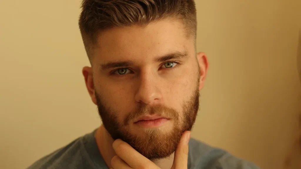 close-up of a man’s trimmed beard and skin