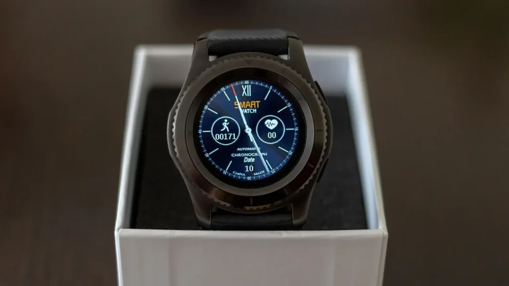 Smartwatch on a wrist showing a colorful display