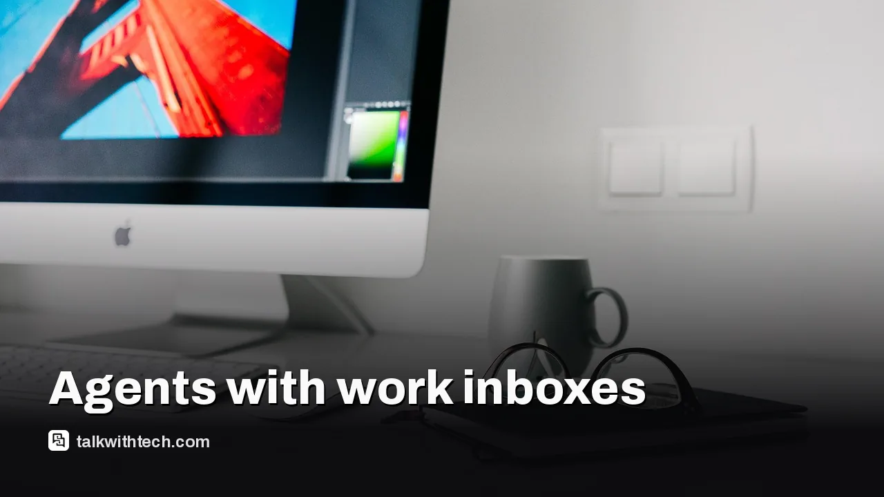 Desk with a laptop and notepad in a modern office