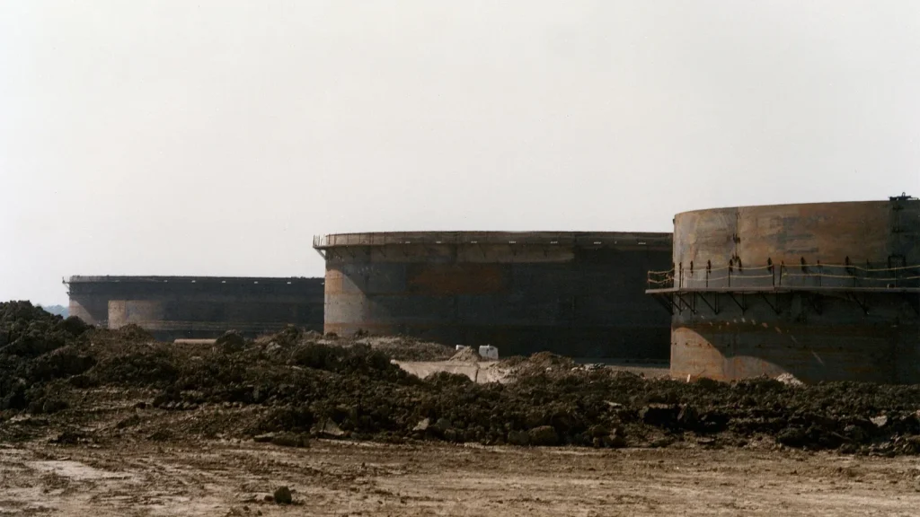 oil reserve barrels and storage tanks