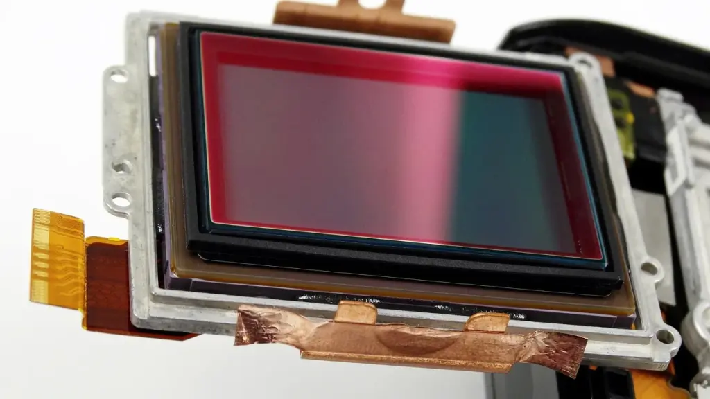 Close-up of a camera sensor with bright lens