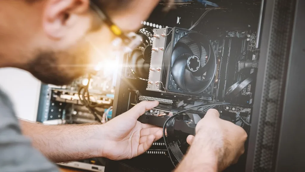 A desktop motherboard on a test bench with RAM slots