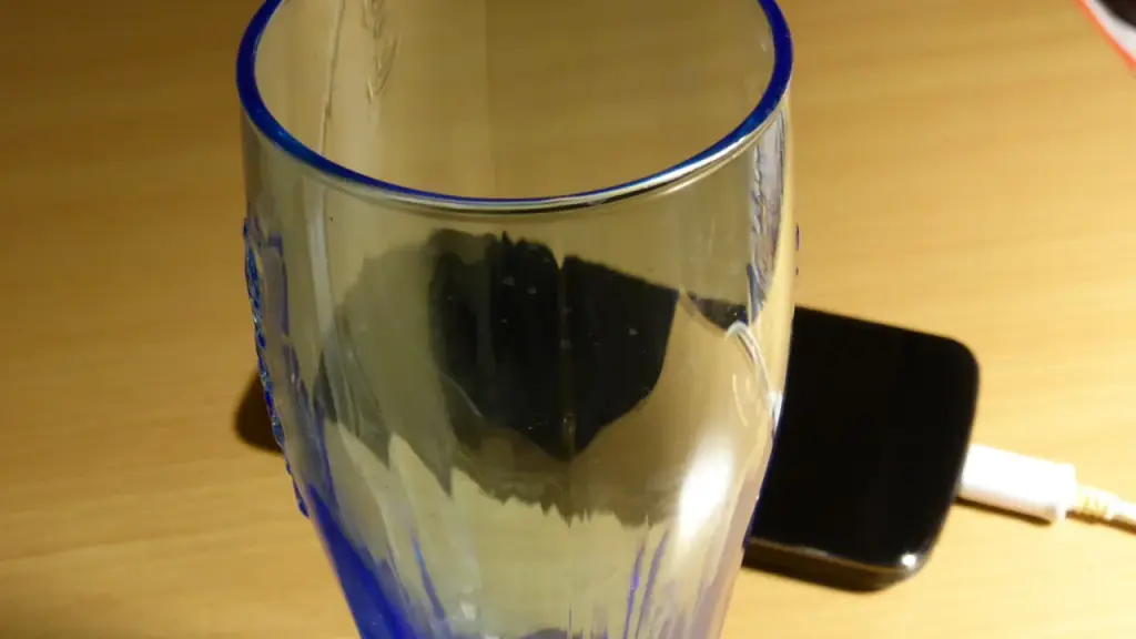Close-up of a compact smartphone resting on a table