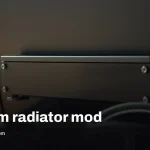 A 360mm radiator bolted to a laptop trims temps and ups FPS