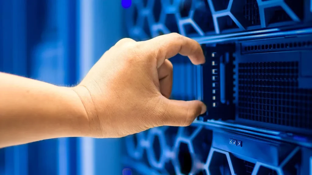 Rows of data center servers with blue lighting