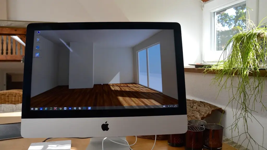 Person looking at a computer screen in a home office