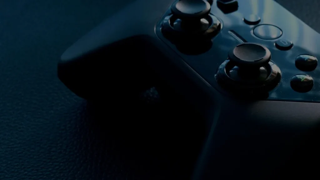 Person using a Bluetooth game controller with a phone
