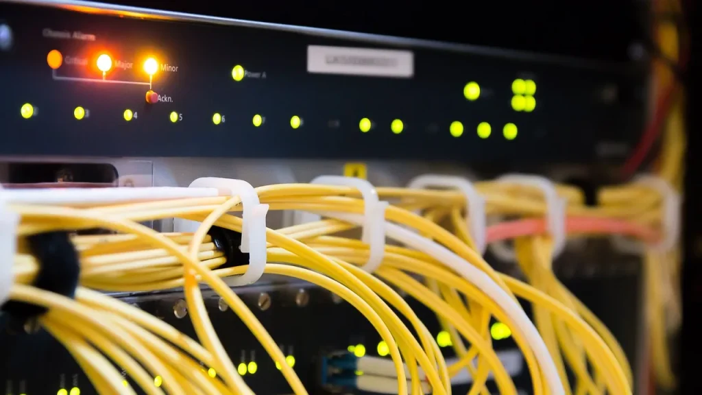 Rows of servers in a data center with blue lights