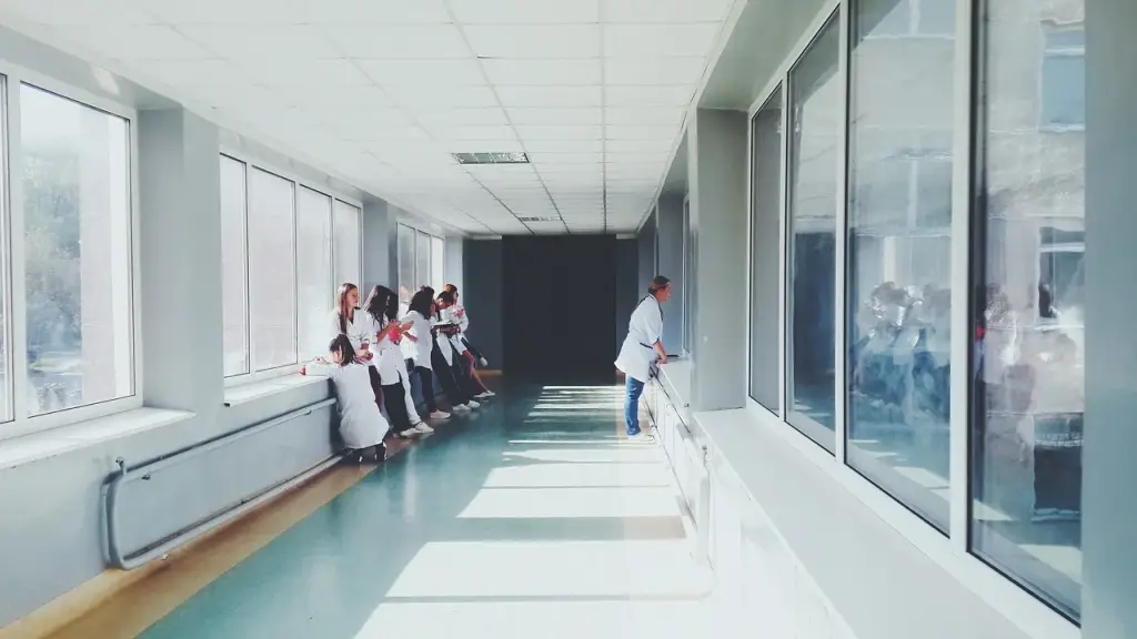 Patients and staff in a hospital corridor
