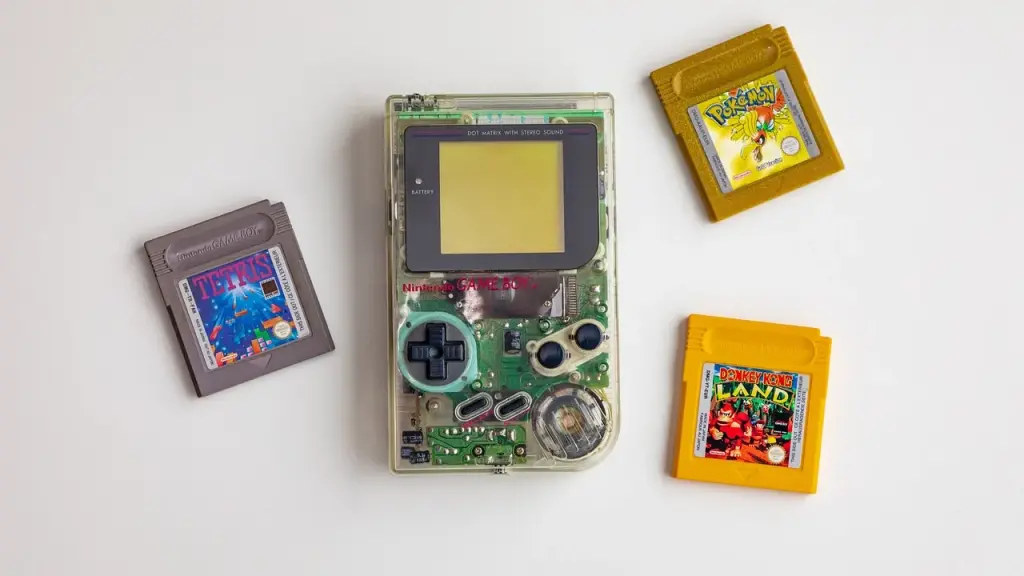 Close-up of a handheld game console with a removable back panel