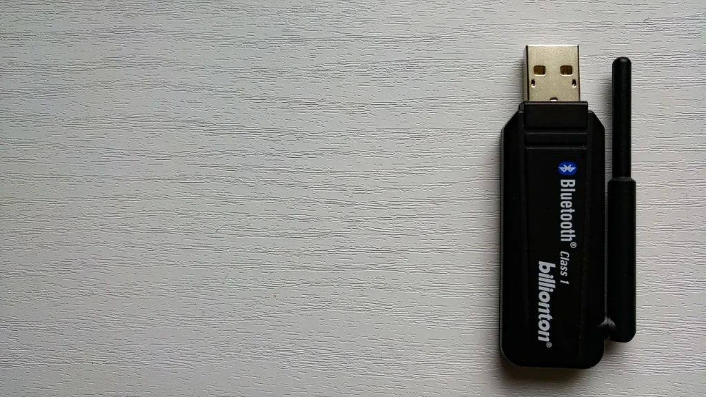 Smartphone near a speaker showing Bluetooth pairing