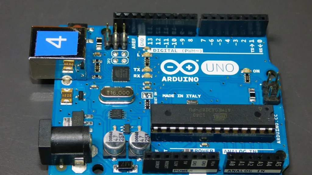 Industrial robot and computer hardware in a lab setting