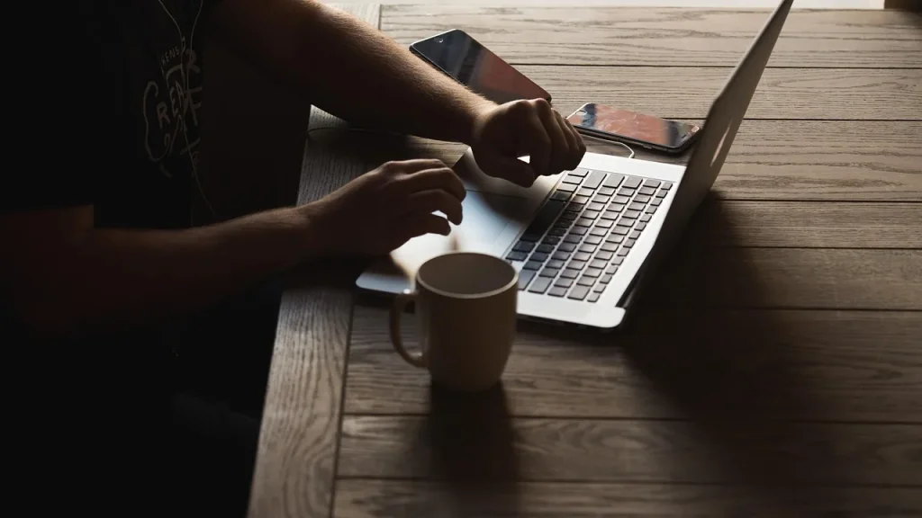 Person using an AI assistant on a laptop
