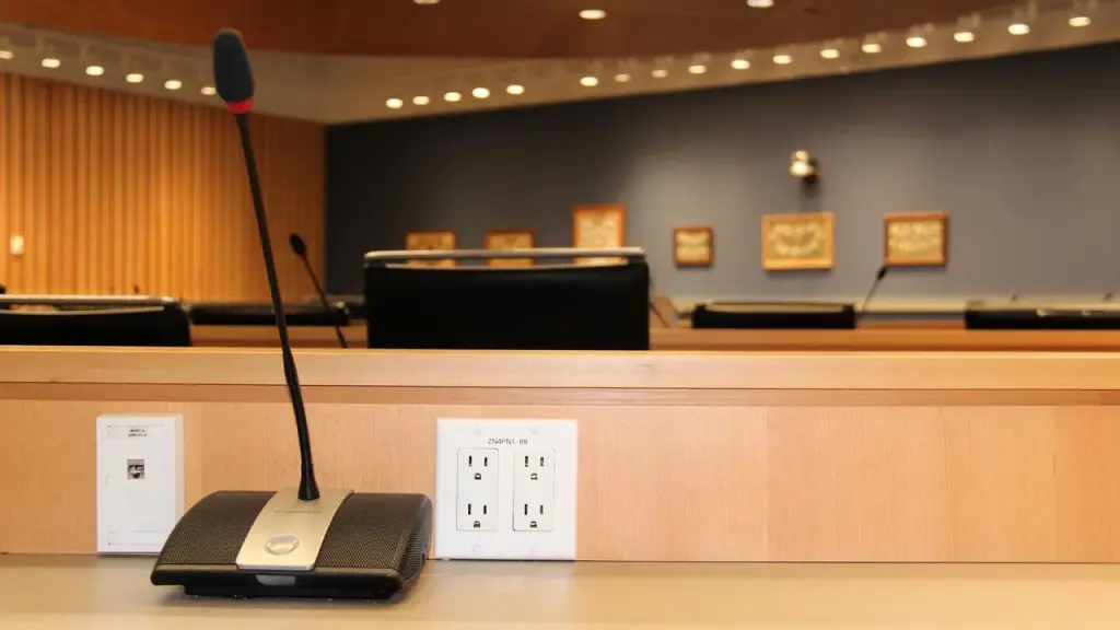 A conference room with a discreet recording device hidden somewhere