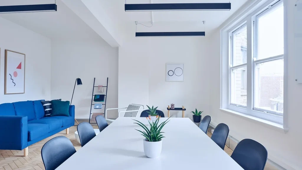 conference room with closed doors and security signage