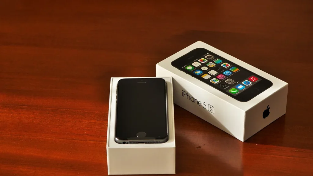 Open brand-new smartphone box with device inside