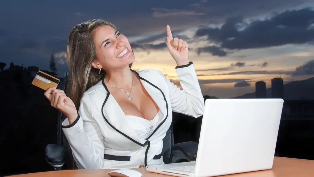 Person comparing laptops on a laptop screen and keyboard
